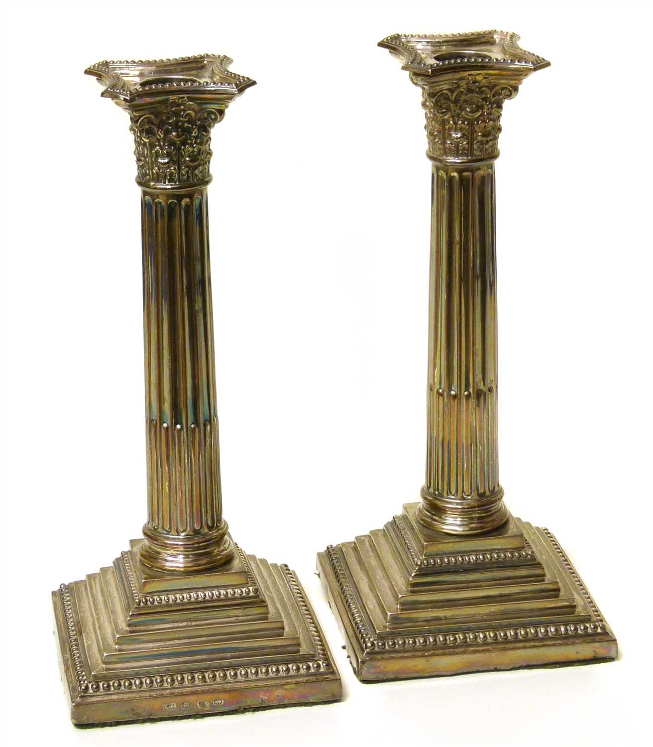 Lot 219 - A pair of Victorian silver candlesticks