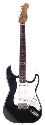 Lot 60 - Squier by Fender stratocaster with accessories.