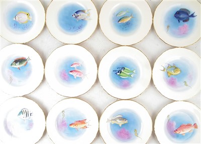 Lot 357 - Set of twelve Royal Worcester plates painted with fish studies