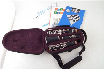 Lot 19 - Sonata clarinet with case and music books.