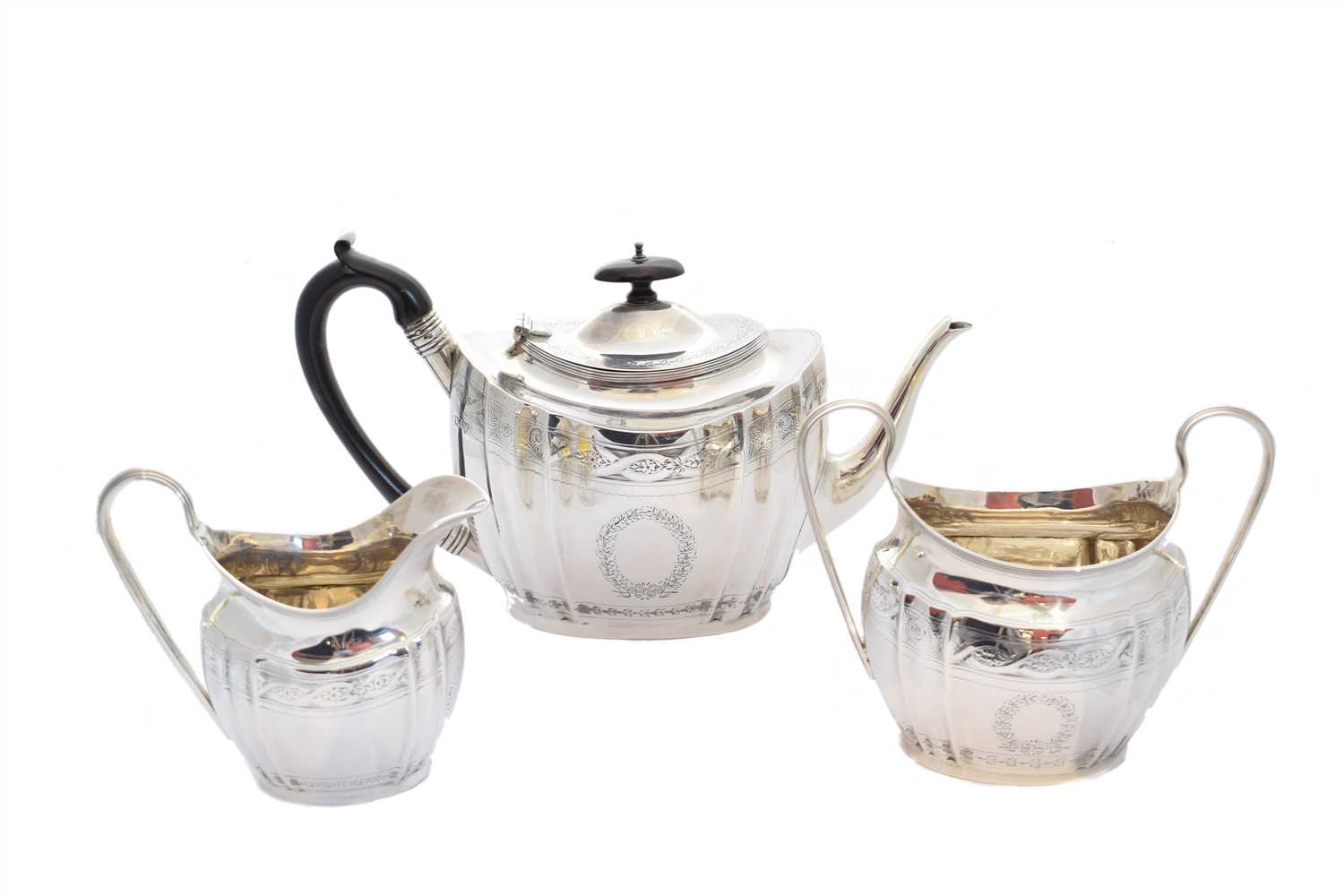 Lot 22 - An Edwardian silver three piece tea set