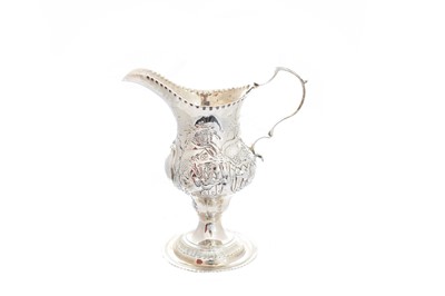 Lot 4 - A George IV silver cream jug