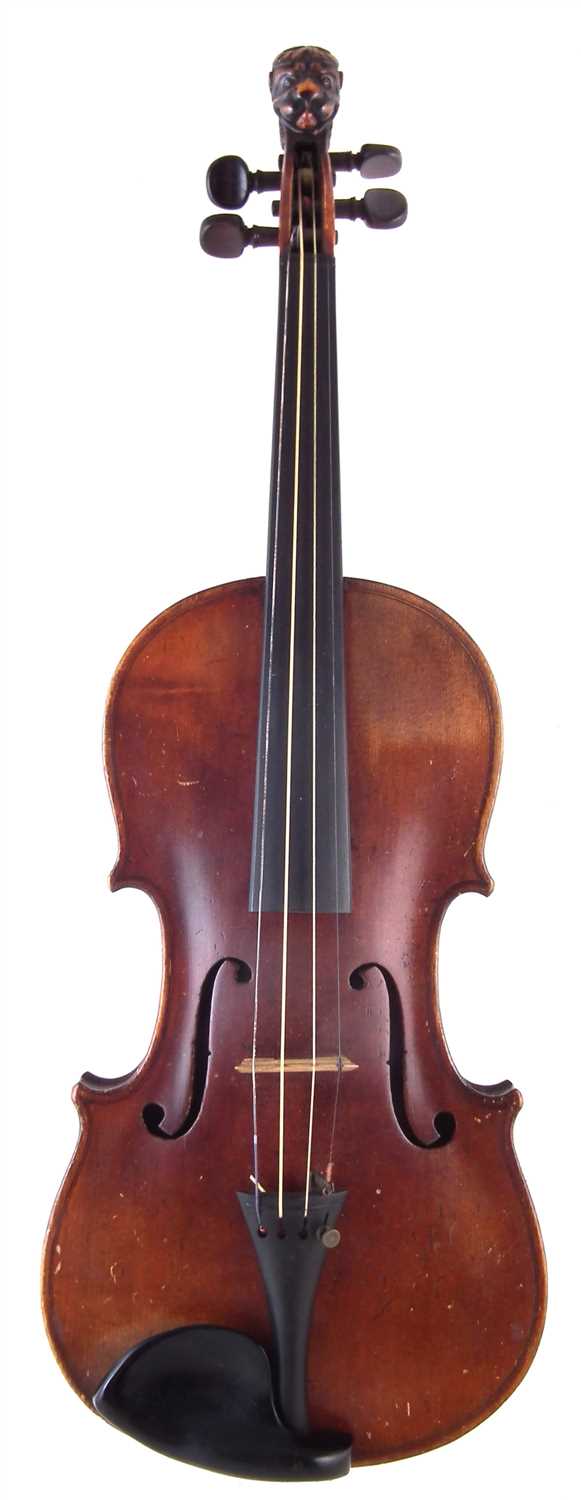 Lot 8 - German violin with lion head scroll and case