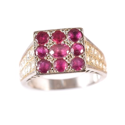 Lot 179 - A ruby and diamond dress ring