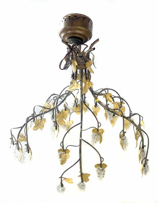 Lot 195 - A electrolier pendant mounted forming a five branch umbrella of vines with Murano glass grapes.