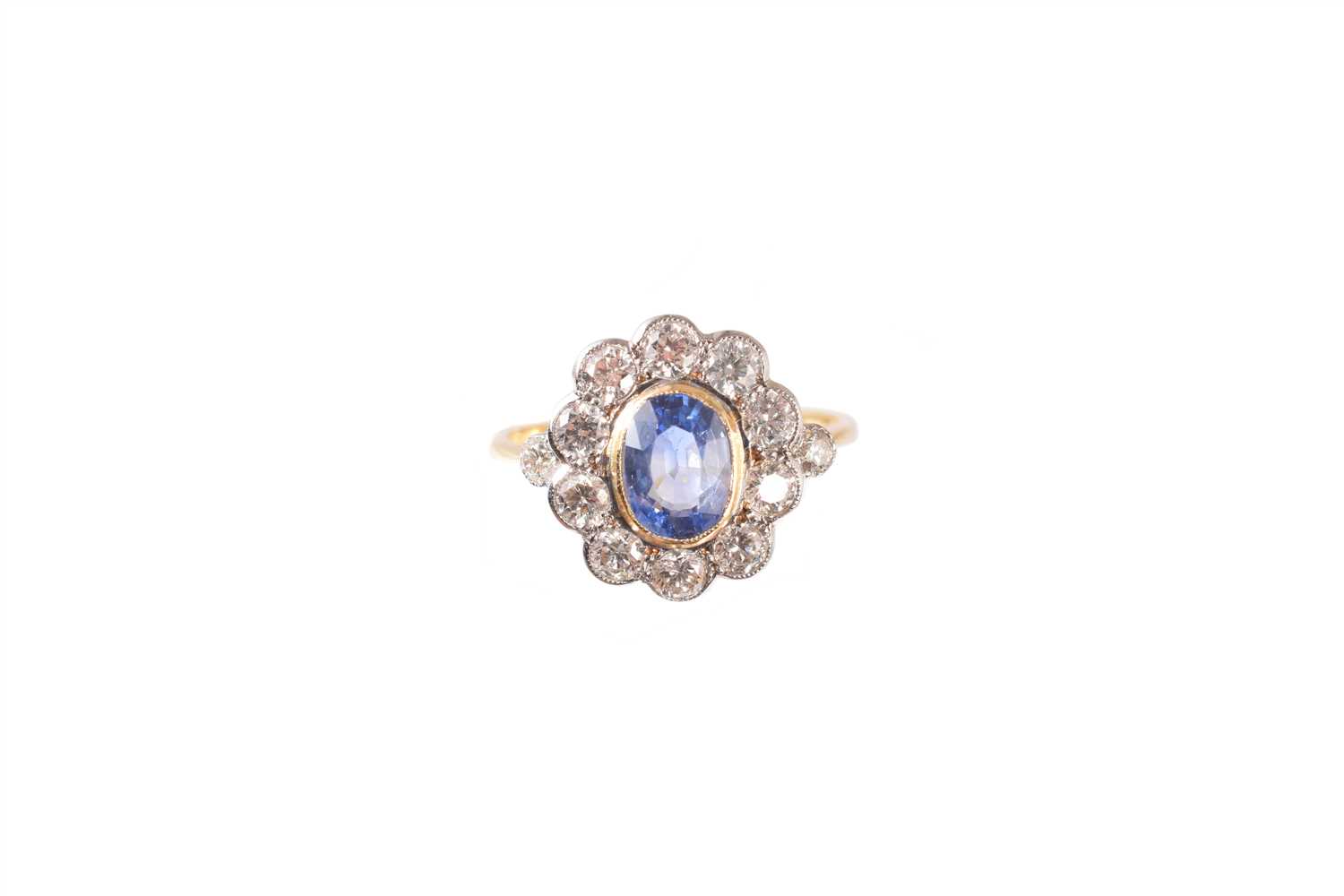 Lot 190 - A sapphire and diamond cluster ring