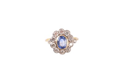 Lot 190 - A sapphire and diamond cluster ring