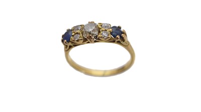 Lot 198 - A sapphire and diamond dress ring.