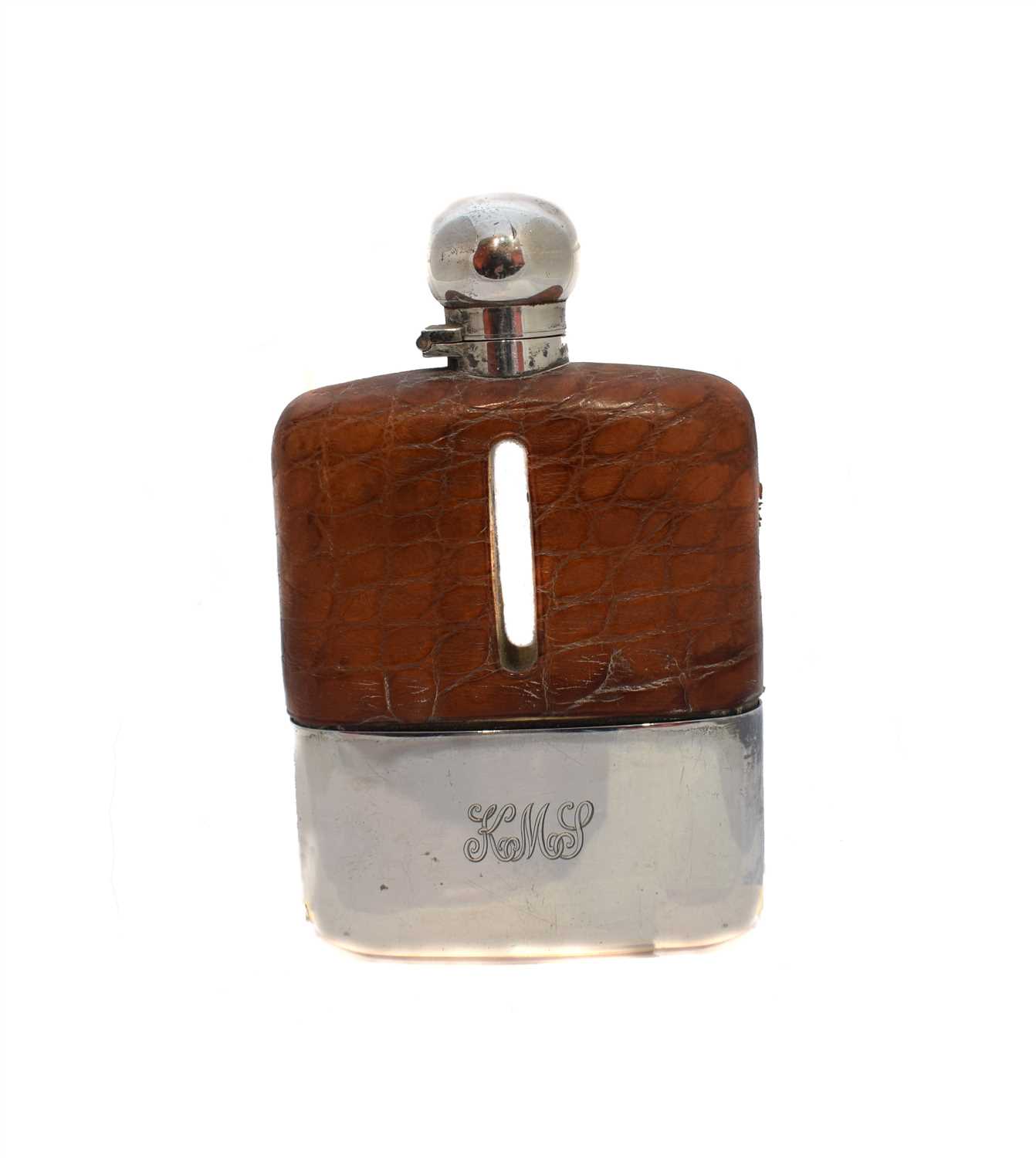 Lot 35 - A 1930's silver and leather cased hip flask