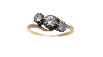 Lot 223 - A diamond three stone ring