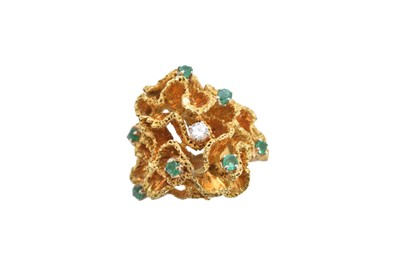 Lot 234 - A mid 20th century emerald and diamond dress ring