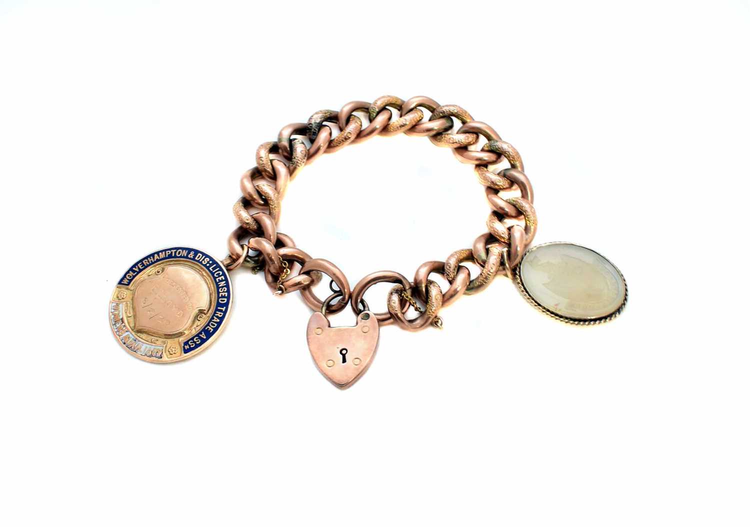 Lot 54 - A charm bracelet