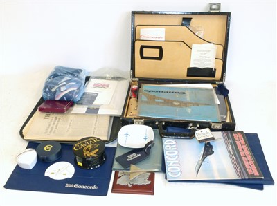 Lot 146 - A collection of Concorde items including menu, place mats, certificates, magazines, ties and heart shaped box etc