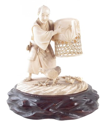 Lot 360 - Japanese ivory Farmer with large net and hens