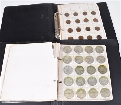 Lot 120 - Two albums of British nineteenth and twentieth century coins from farthings to halfcrowns.