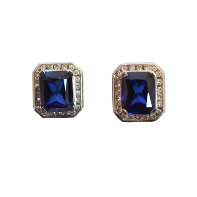 Lot 108 - A pair of synthetic sapphire and diamond earrings