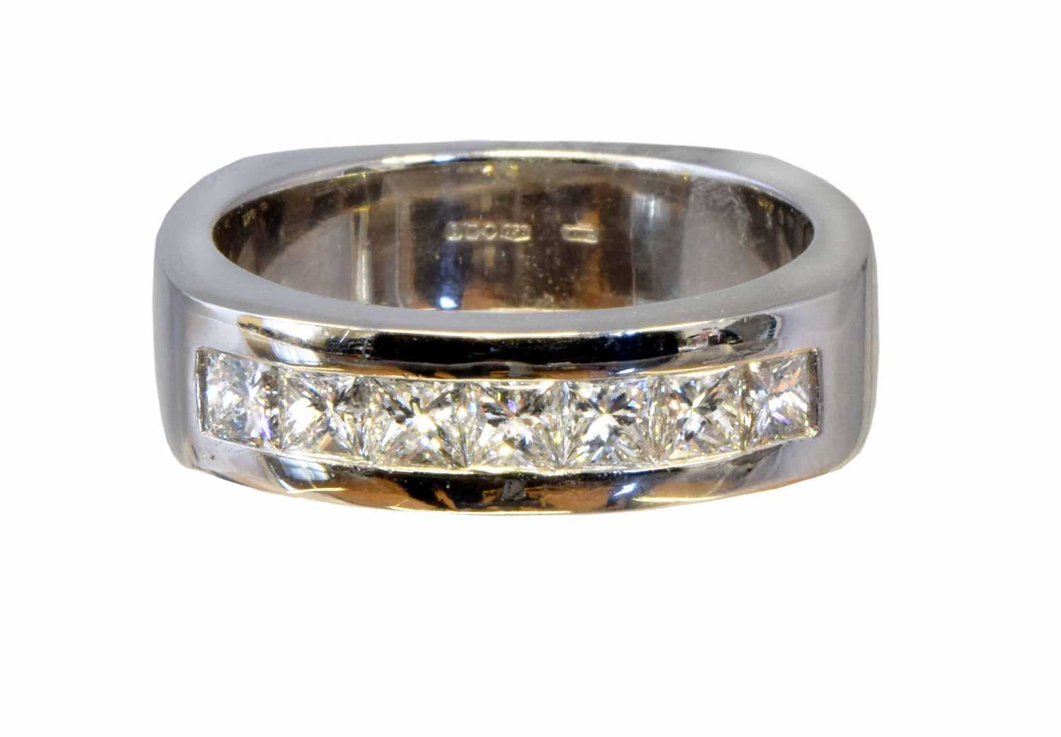 Lot 203 - A platinum diamond band ring by David M Robinson