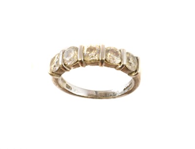 Lot 227 - A platinum diamond five stone ring