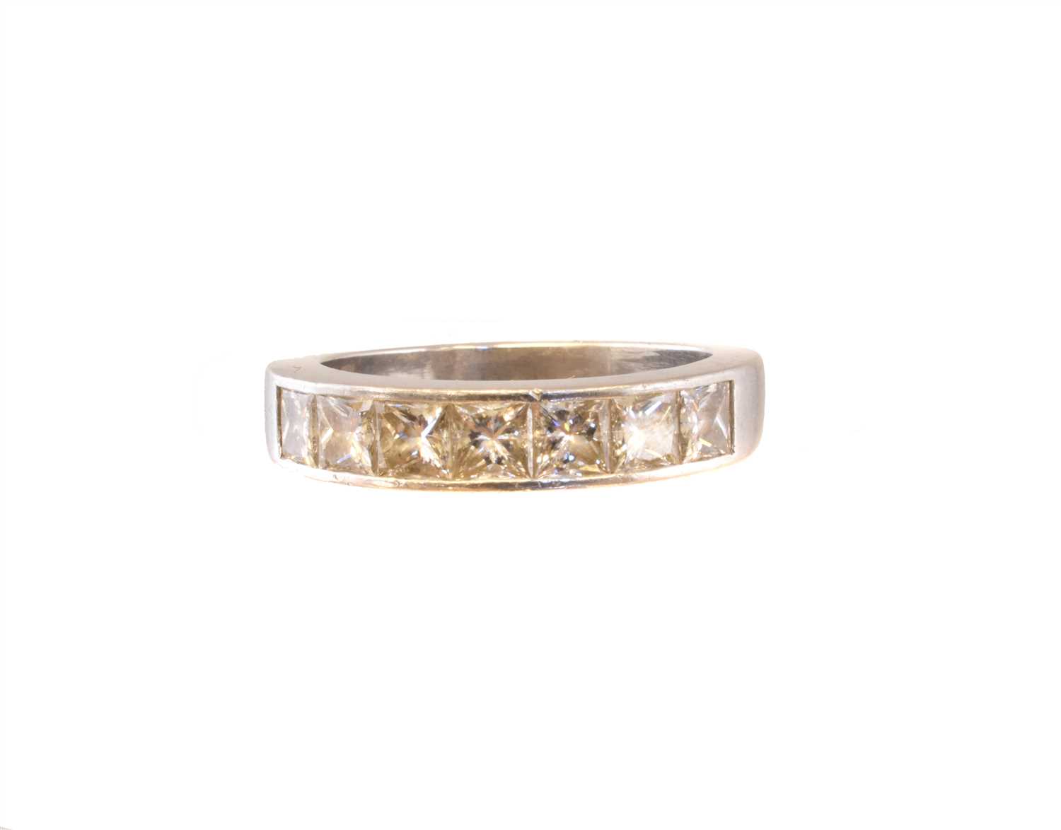 Lot 231 - A platinum diamond band ring