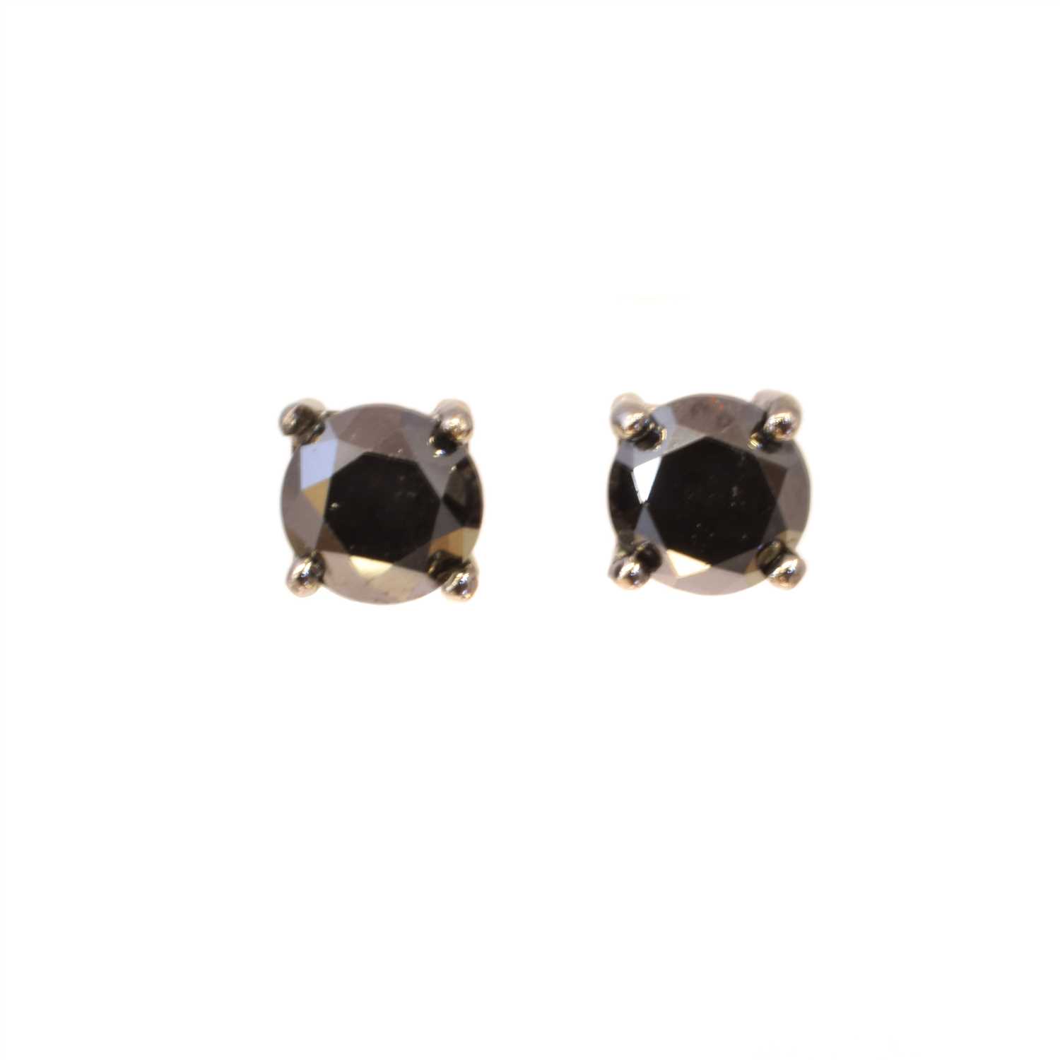 Lot 116 - A pair of brilliant cut black diamond stud earrings