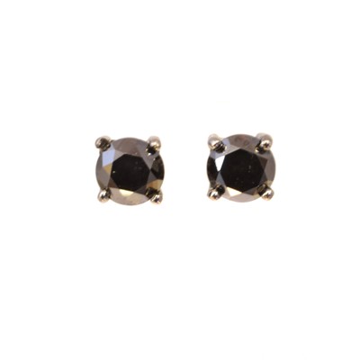 Lot 116 - A pair of brilliant cut black diamond stud earrings