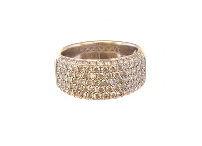 Lot 183 - An 18ct gold diamond band ring