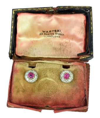 Lot 121 - A pair of Burmese pink sapphire and diamond earrings retailed by Wartski