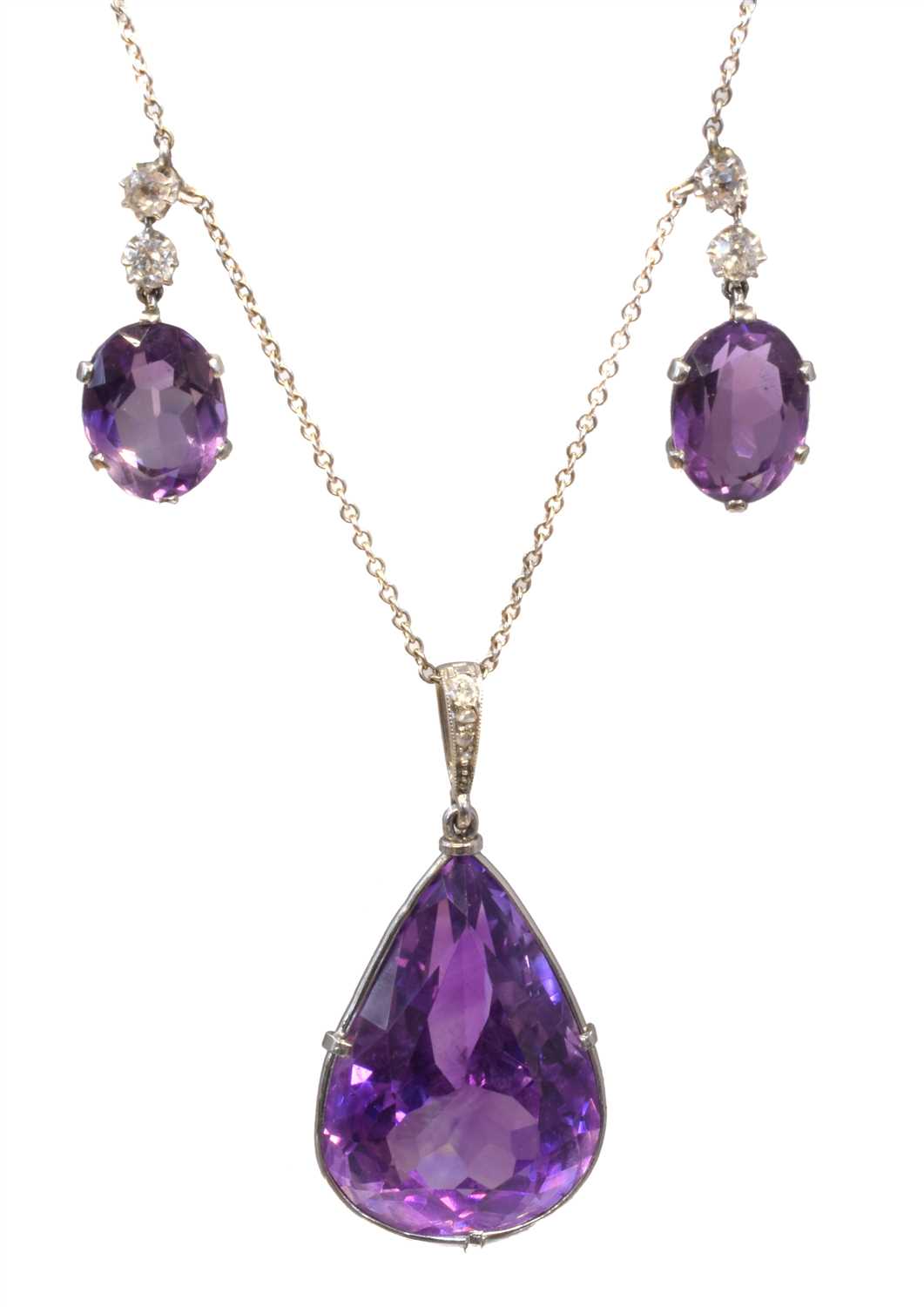 Lot 142 - An amethyst and diamond pendant necklace retailed by Wartski