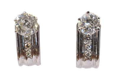 Lot 109 - A pair of 18ct gold diamond earrings