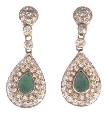 Lot 260 - A pair of 18ct gold emerald and diamond earrings