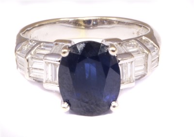 Lot 184 - A sapphire and diamond dress ring