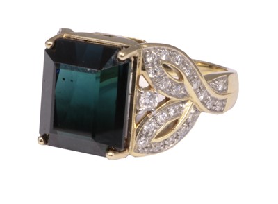Lot 194 - An 18ct gold tourmaline and diamond dress ring