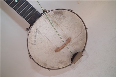 Lot 108 - George Formby banjolele with case and music