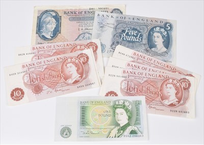 Lot 43 - Collection of 13 British banknotes to include five pounds, one pound and ten shillings (13).