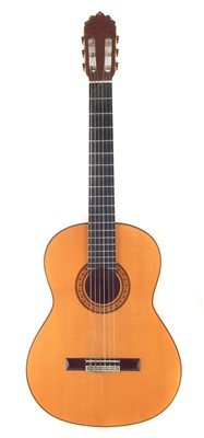 Lot 38 - Joan Cashmira guitar with case.