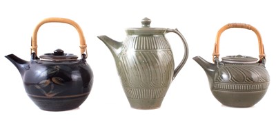 Lot 249 - Derek Emms (1929-2004) coffee pot and two tea pots, the largest stands 20cm high.