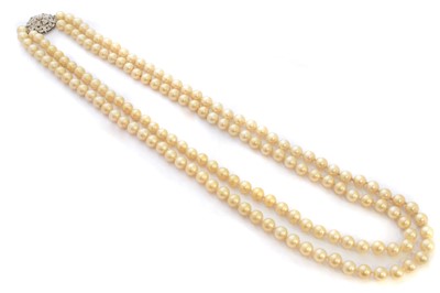 Lot 82 - A diamond and imitation pearl necklace