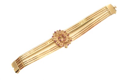 Lot 21 - An 18ct gold ruby bracelet