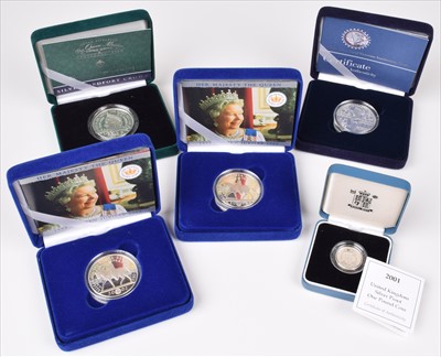 Lot 23 - Five assorted Royal Mint cased silver proof coins (5).