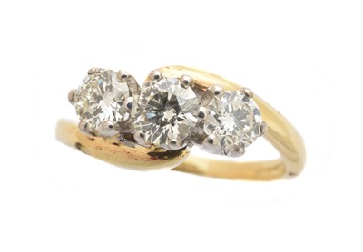 Lot 291 - An 18ct gold diamond three stone ring