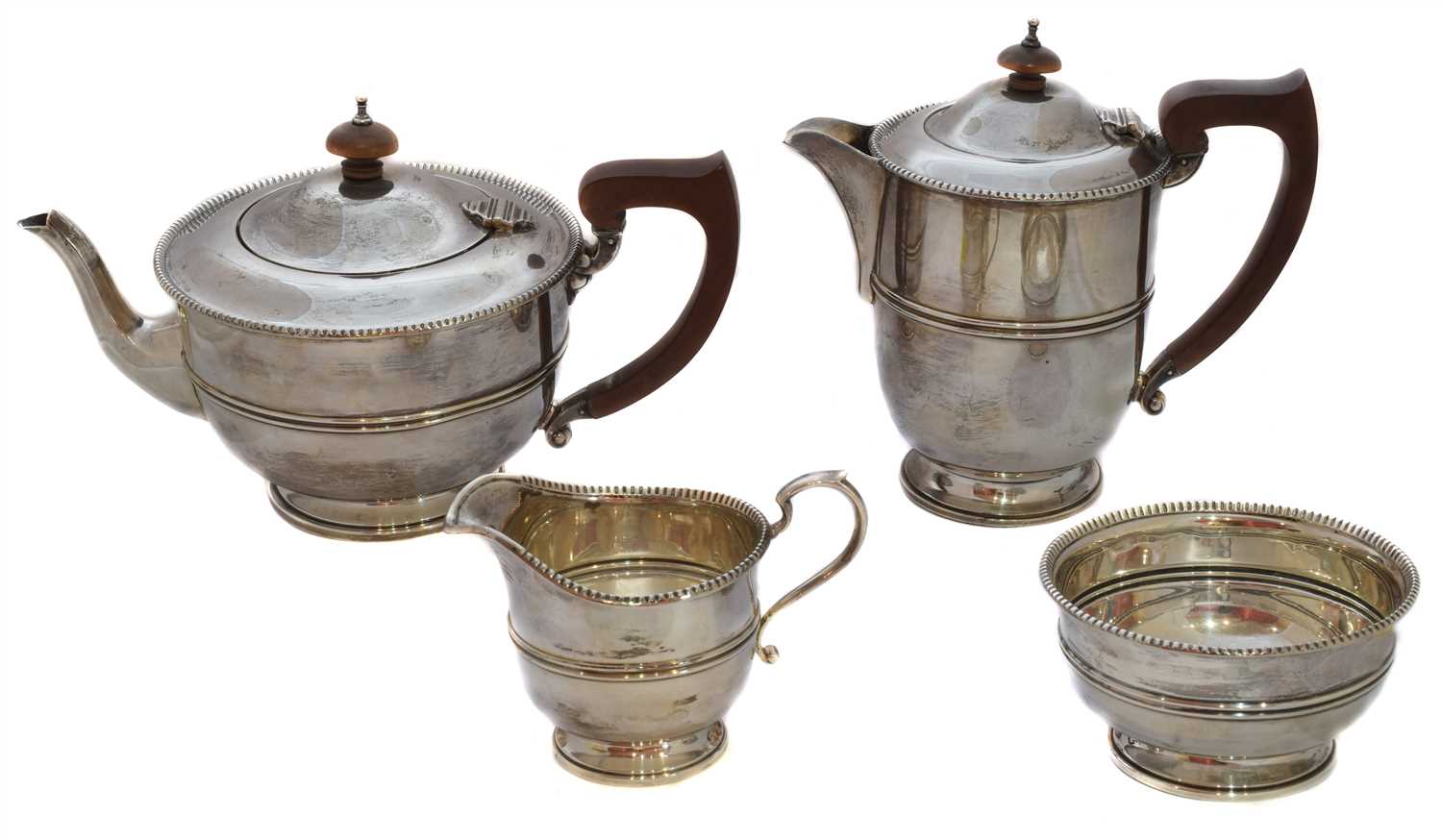 Lot 21 - A 1930s silver four piece tea set