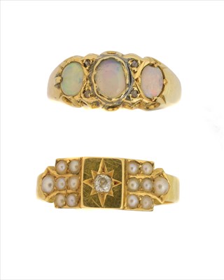Lot 308 - Two 18ct gold gem set dress rings