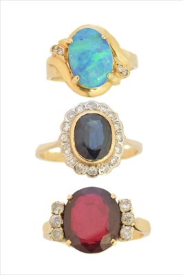 Lot 309 - Three gem-set dress rings