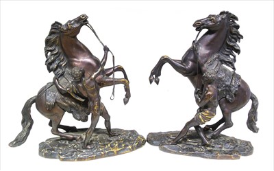 Lot 173 - A pair of Bronze Marley horses after Coustan