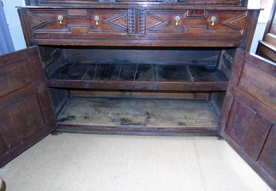 Lot 314 - 17th century oak Merioneth press cupboard