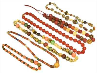 Lot 203 - A selection of beads, to include Chinese...