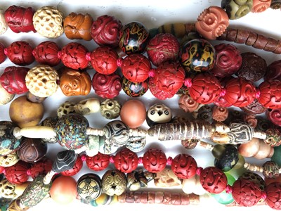 Lot 203 - A selection of beads, to include Chinese...