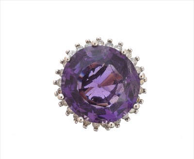Lot 303 - A 9ct gold amethyst and diamond cluster ring