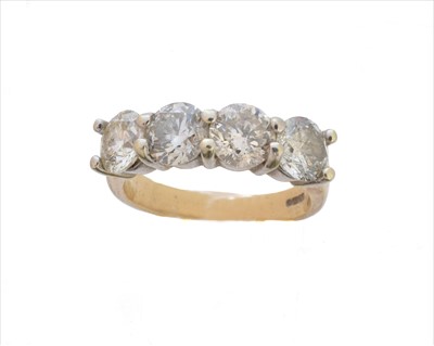 Lot 138 - A 9ct gold diamond four stone ring