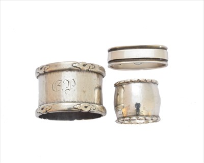 Lot 246 - Three Danish silver napkin rings